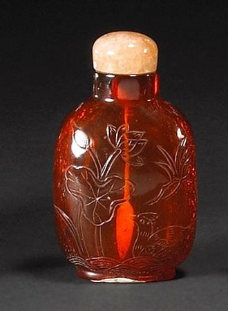 An_amber_snuff_bottle_Melikian